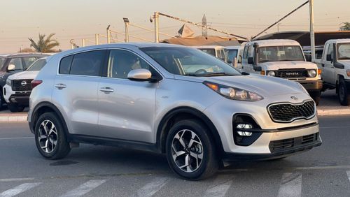 كيا سبورتيج 2021 Kia Sportage 2.4L V4 MidOption+ - AWD 4x4 - Apple & Android Play Full Serviced - 56000 mileage