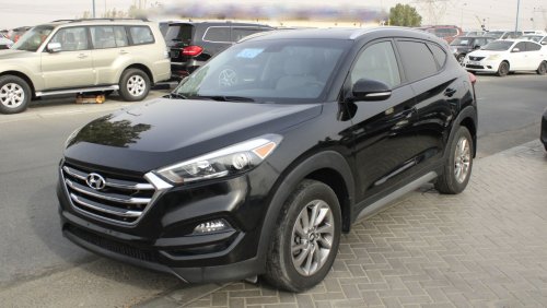 Hyundai Tucson 1.6T GDI TURBO / Driver Power Seat / DVD / Leather Seats (LOT # 3159)