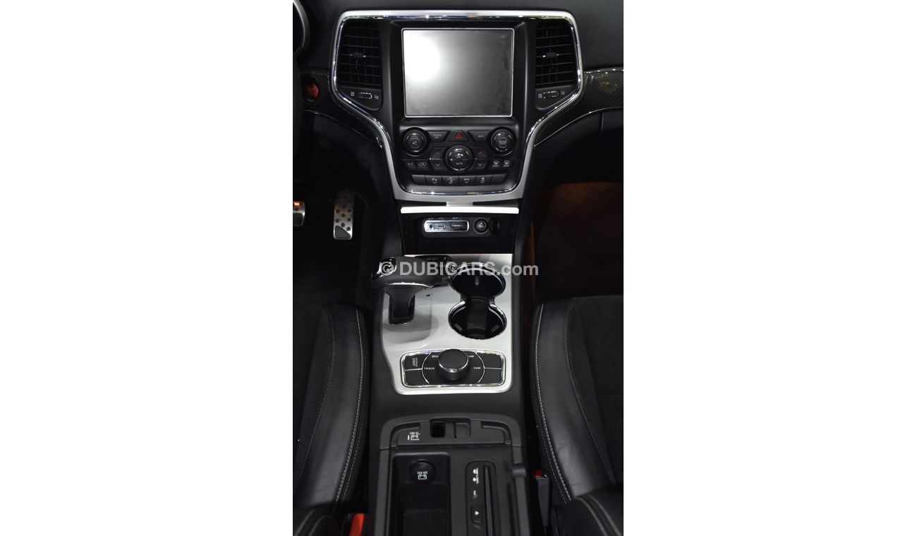 Jeep Grand Cherokee EXCELLENT DEAL for our Jeep Grand Cherokee SRT ( 2015 Model ) in Grey Color GCC Specs