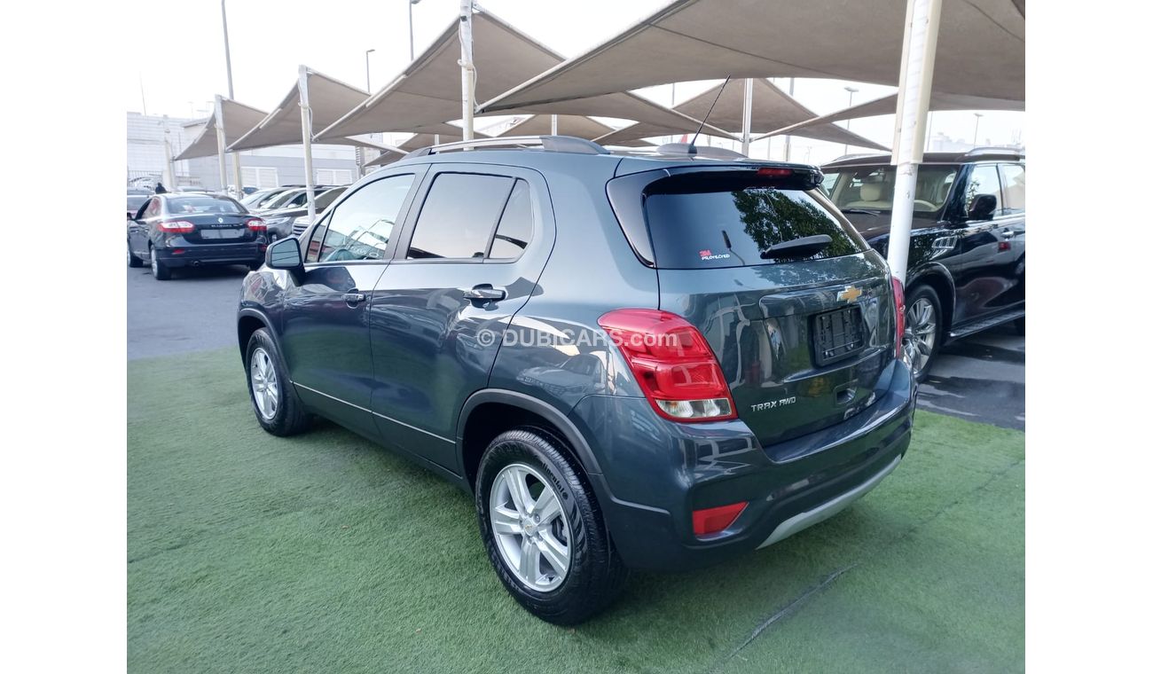 Chevrolet Trax 2021 model, import 1400 CC, gray color, cruise control, rear spoiler, rear camera screen, in excelle