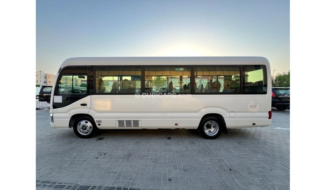 Toyota Coaster 2024 Toyota Coaster 23-Seater 3-Point Seatbelts 4.2L 6-Cyl Diesel M/T RWD (Export Only)