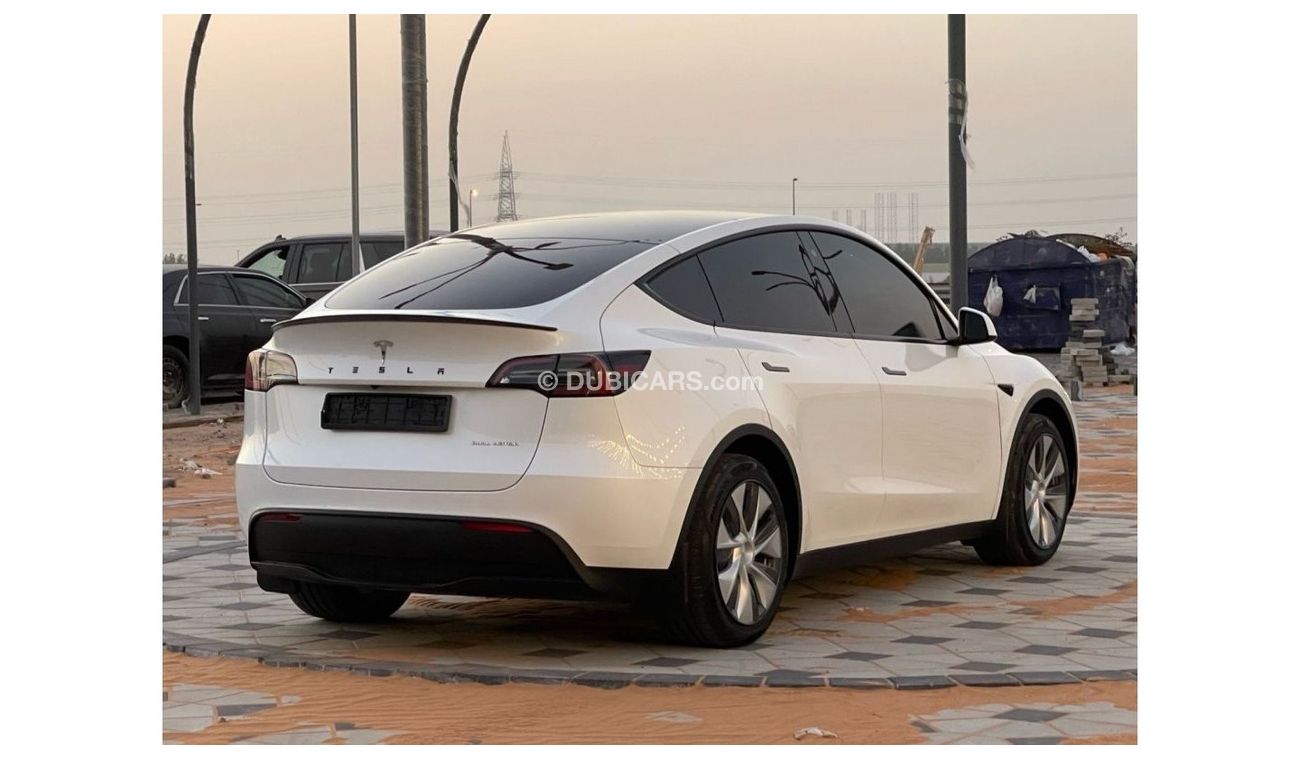 Tesla Model Y TESLA MODEL Y LONG RANGE DUAL MOTOR MODEL : 2023 MILEAGE : 24,000 km PRICE : 172,000 DIRHAMS Gulf sp