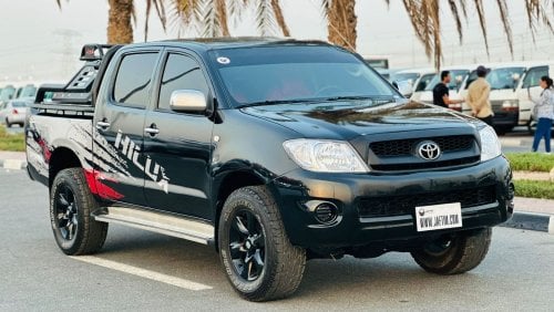 Toyota Hilux DOUBLE CABIN | PREMIUM SPORTS BAR WITH BASKET | 2009 | 2.7L PETROL | LHD | MANUAL | RED INTERIOR