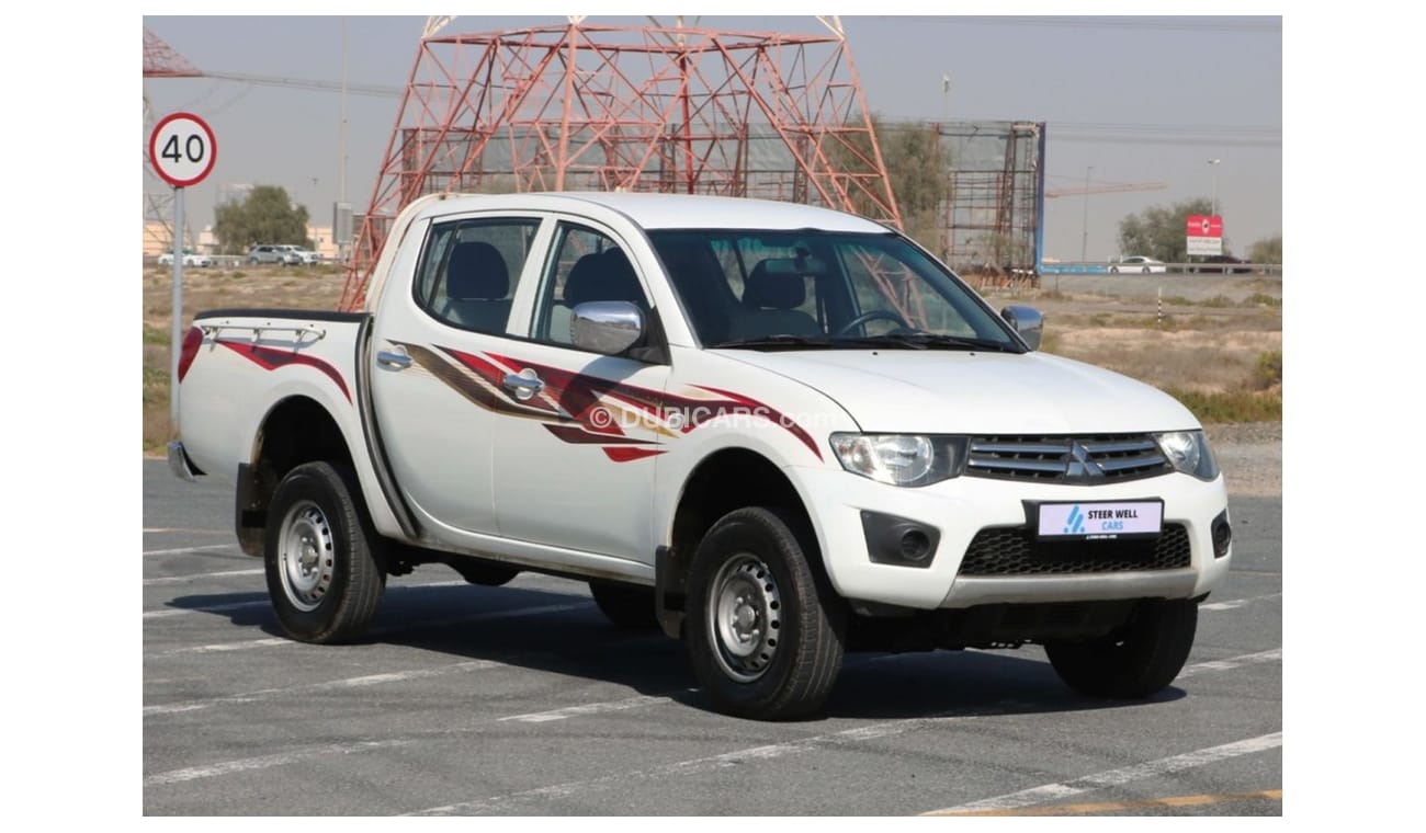 Mitsubishi L200 2015 |  L200 D/C 4X4 DIESEL MT WITH GCC SPECS AND EXCELLENT CONDITION