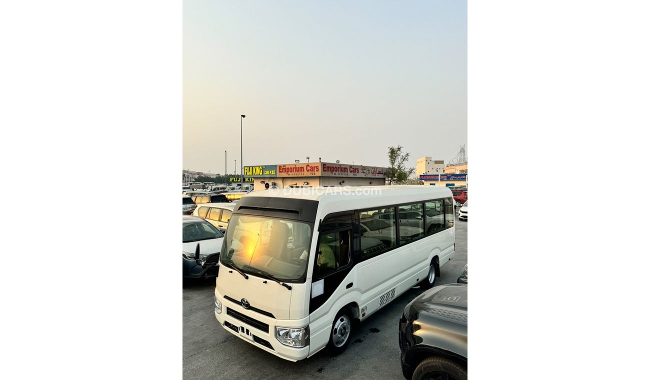 Toyota Coaster 2024 TOYOTA COSTER 4.0L DIESEL WITH COOLBOX, LUGGAGE RACK, CURTAINS, 22 SEATS MT