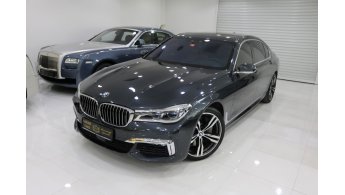 BMW 750li XDRIVE розовая