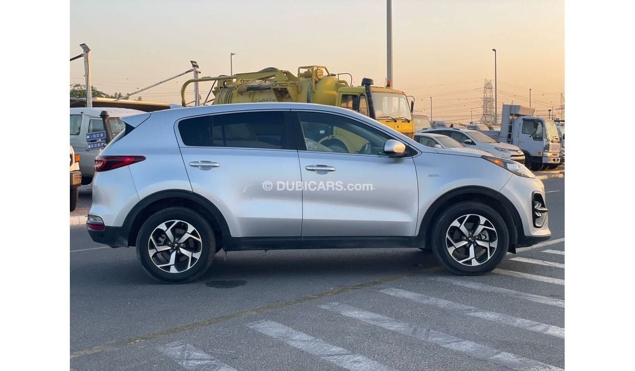 كيا سبورتيج 2021 Kia Sportage 2.4L V4 MidOption+ - AWD 4x4 - Apple & Android Play Full Serviced - 56000 mileage