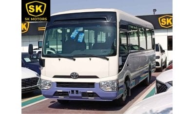 تويوتا كوستر 4.2L V6 DIESEL / 23 STR M/T / AUTO DOOR /  LUGGAGE RACKS (CODE # CD42B)