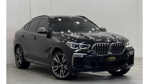 بي أم دبليو X6 50i Exclusive 4.4L 2021 BMW X6 M50i, 2026 AGMC Agency Warranty + Service Package, Full Service Histo