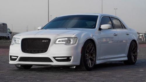 Chrysler 300C SRT8 Chrysler 300 SRT Model : 2015 Mileage : 197,000 km Price : 65,000 dirhams Gulf specifications ,