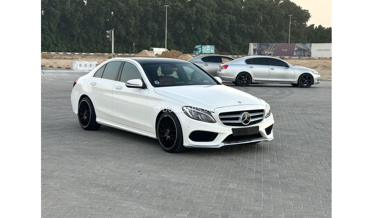 مرسيدس بنز C200 MODEL 2016 GCC CAR PERFECT CONDITION FULL OPTION PANORAMIC ROOF AMG