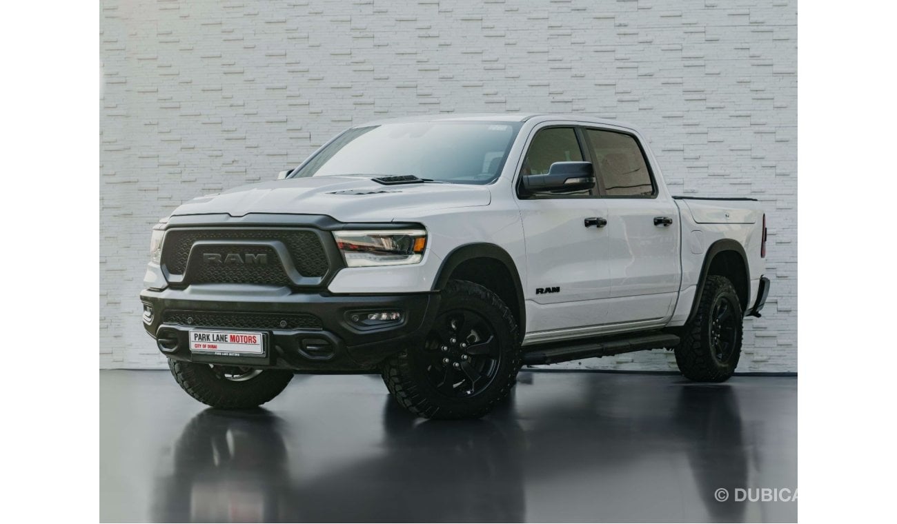 RAM 1500 AED 3,302 PM • RAM 1500 REBEL LUXURY • ONLY 28,000 KMS • 5.7L HEMI® V8 • OFFICIAL DODGE WARRANTY