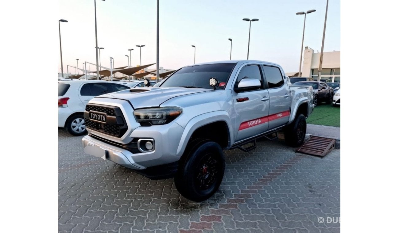 تويوتا تاكوما Toyota Tacoma TRD model:2023 V8 4x4 6 cylinder amrican space in good condition it has all lanch cont