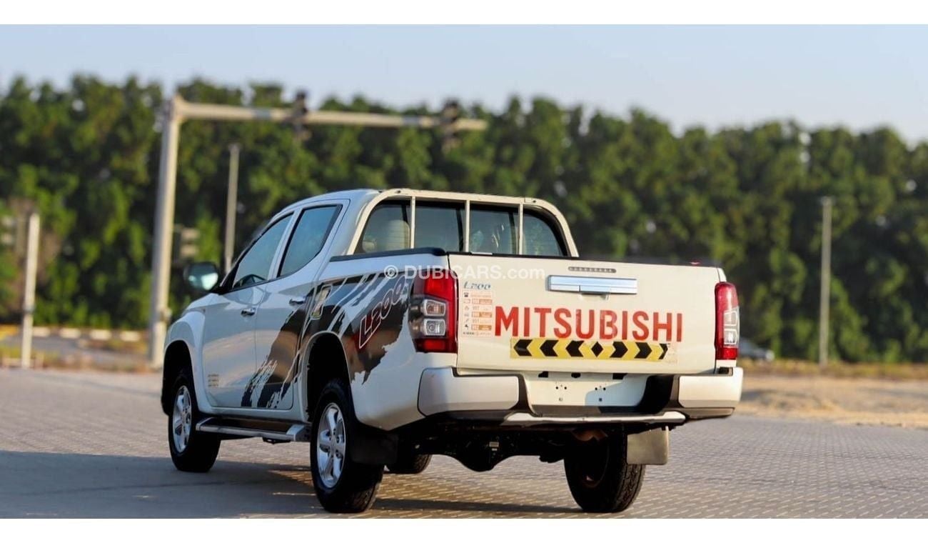 ميتسوبيشي L200 GLX 2.4L Mitsubishi L200 2.4 L 2021 GCC accident free in excellent condition 1303 P.M