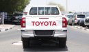 Toyota Hilux 2.4L diesel  . White 2023 model, M/T Wide body with Chrome bumper